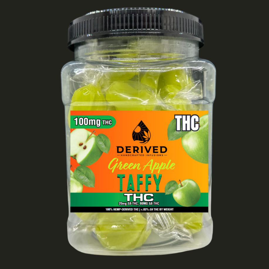 Jar of THC-infused green apple taffy with label on a black background